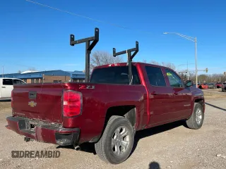 2018 Chevrolet Silverado 1500 LT with VIN 3GCUKRECXJG257926, listed as a Copart auction lot 52463635 with 272,996 mi miles and Clean Title. Bid and sale history available at carsss.com. Image 4.