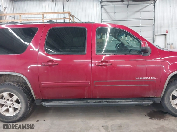2013 GMC Yukon XL SLT with VIN 1GKS2KE75DR333420, listed as a IAAI auction lot 41712106 with 234,473 mi miles. Bid and sale history available at carsss.com. Image 13.