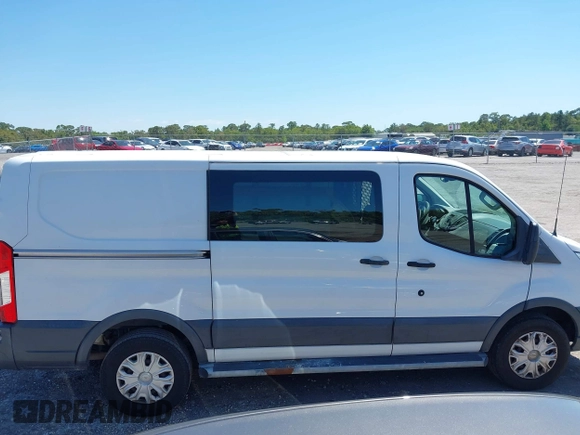 2018 Ford Transit z VIN 1FTYR1YM3JKB16286, wystawiony jako IAAI lot #42038526 z przebiegiem 135 734 mil mil oraz . Historia ofert i sprzedaży dostępna na DreamBid. Obrazek 13.