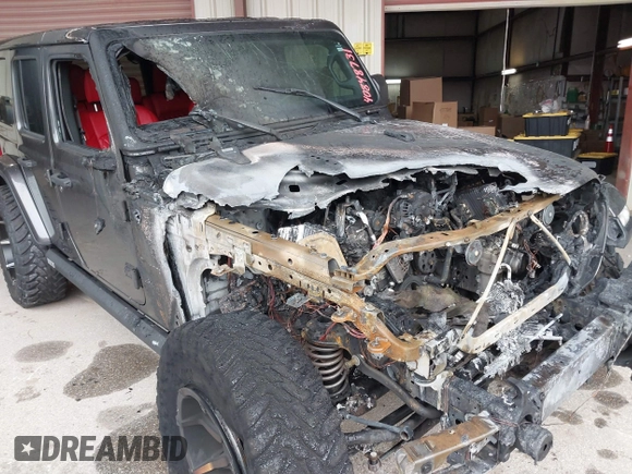 2019 Jeep Wrangler Unlimited Sahara with VIN 1C4HJXEG7KW661801, listed as a IAAI auction lot 40848731 with Not provided miles and . Bid and sale history available at DreamBid. Image 6.