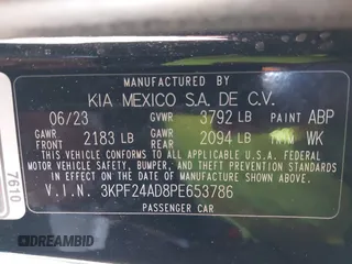 2023 Kia Forte LXS with VIN 3KPF24AD8PE653786, listed as a IAAI auction lot 41724948 with 27,598 mi miles and . Bid and sale history available at DreamBid. Image 9.