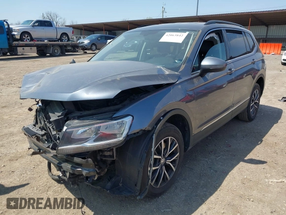 2020 Volkswagen Tiguan SE with VIN 3VV2B7AX4LM074385, listed as a IAAI auction lot 42063842 with 101,092 mi miles and . Bid and sale history available at DreamBid. Image 2.