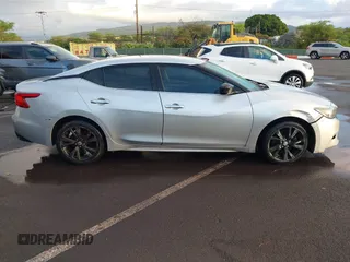 2016 Nissan Maxima S z VIN 1N4AA6AP1GC411633, wystawiony jako IAAI lot #41559508 z przebiegiem 95 240 mil mil oraz . Historia ofert i sprzedaży dostępna na DreamBid. Obrazek 13.