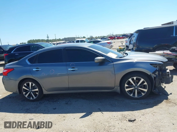 2016 Nissan Altima SR with VIN 1N4AL3AP1GC285363, listed as a IAAI auction lot 41754598 with 121,923 mi miles and . Bid and sale history available at carsss.com. Image 13.
