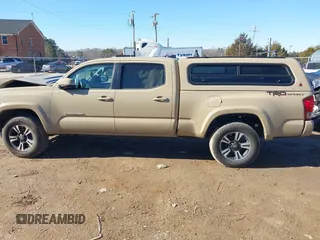 2017 Toyota Tacoma SR5 with VIN 3TMBZ5DN8HM009538, listed as a IAAI auction lot 41288551 with 84,551 mi miles and . Bid and sale history available at DreamBid. Image 14.