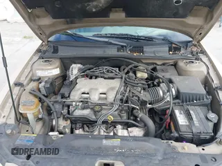 2002 Pontiac Grand Am SE1 z VIN 1G2NF52E52C183797, wystawiony jako IAAI lot #42328407 z przebiegiem Nie podano mil oraz . Historia ofert i sprzedaży dostępna na DreamBid. Obrazek 10.