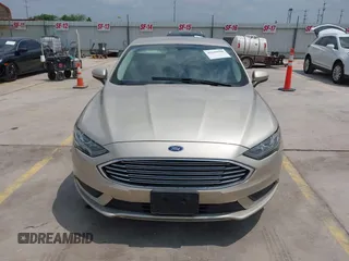 2018 Ford Fusion SE z VIN 3FA6P0H75JR176394, wystawiony jako IAAI lot #42169780 z przebiegiem 65 617 mil mil oraz . Historia ofert i sprzedaży dostępna na DreamBid. Obrazek 12.
