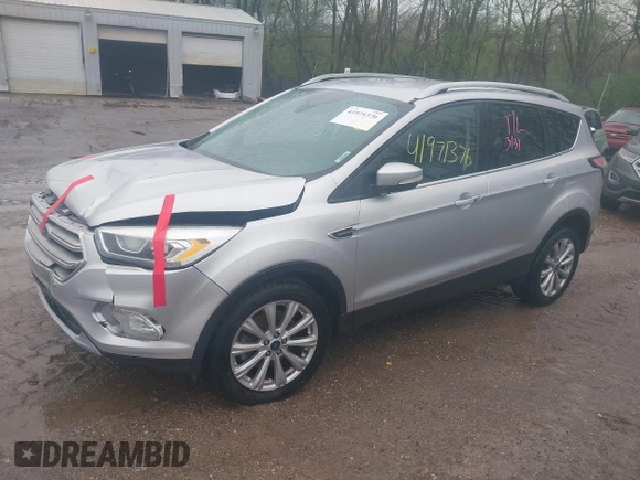2017 Ford Escape Titanium with VIN 1FMCU0J96HUC21987, listed as a IAAI auction lot 41971376 with 97,488 mi miles and . Bid and sale history available at DreamBid. Image 17.