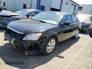 2010 Toyota Avalon XL with VIN 4T1BK3DB0AU358074, listed as a Copart auction lot 68949064 with 144,429 mi miles and Salvage Title. Bid and sale history available at carsss.com. Image 1.