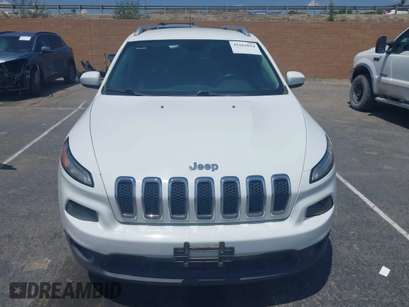 2015 Jeep Cherokee Latitude with VIN 1C4PJLCB7FW790865, listed as a IAAI auction lot 42182034 with 161,642 mi miles and . Bid and sale history available at carsss.com. Image 12.