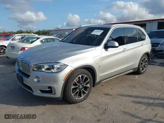 2018 BMW X5 xDrive40e iPerformance with VIN 5UXKT0C53J0V98060, listed as a IAAI auction lot 41456809 with 75,407 mi miles. Bid and sale history available at carsss.com. Image 18.