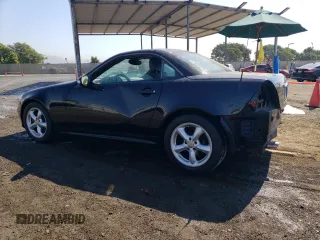 2002 Mercedes-Benz SLK-Class 3.2L with VIN WDBKK65F12F254172, listed as a Copart auction lot 74336334 with 148,405 mi miles and Salvage Title. Bid and sale history available at carsss.com. Image 2.