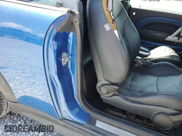2006 MINI Convertible S with VIN WMWRH33566TK58973, listed as a Copart auction lot 51295575 with Not provided miles and Salvage title. Bid and sale history available at DreamBid. Image 12.