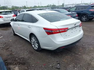 2013 Toyota Avalon XLE z VIN 4T1BK1EBXDU028546, wystawiony jako IAAI lot #42352506 z przebiegiem 144 139 mil mil oraz . Historia ofert i sprzedaży dostępna na DreamBid. Obrazek 3.