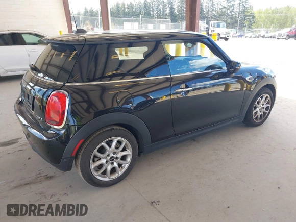 2021 MINI Hardtop Cooper with VIN WMWXR3C0XM2N93195, listed as a IAAI auction lot 42083421 with 46,269 mi miles and . Bid and sale history available at DreamBid. Image 4.