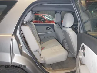 2005 Chevrolet Equinox LS z VIN 2CNDL13F356181202, wystawiony jako IAAI lot #42265227 z przebiegiem 120 799 mil mil oraz . Historia ofert i sprzedaży dostępna na DreamBid. Obrazek 8.