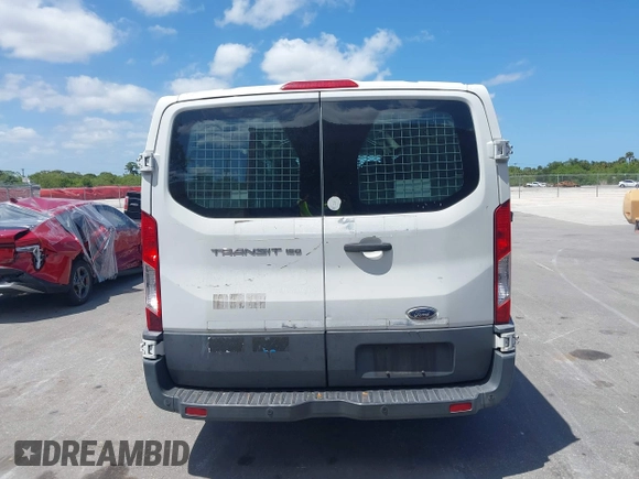 2015 Ford Transit Cargo with VIN 1FTNE1YM7FKA95206, listed as a IAAI auction lot 42083733 with 195,306 mi miles. Bid and sale history available at carsss.com. Image 16.