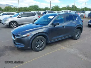 2021 Mazda CX-5 Touring with VIN JM3KFACM2M1348305, listed as a IAAI auction lot 41627199 with 30,044 mi miles. Bid and sale history available at carsss.com. Image 18.