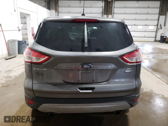 2014 Ford Escape SE with VIN 1FMCU9GX8EUB98833, listed as a Copart auction lot 50234445 with 181,893 mi miles and Clean Title. Bid and sale history available at DreamBid. Image 6.