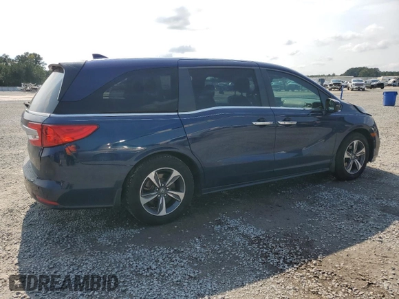 2020 Honda Odyssey Touring with VIN 5FNRL6H85LB003302, listed as a Copart auction lot 72709924 with 58,228 mi miles and Salvage Title. Bid and sale history available at DreamBid. Image 3.