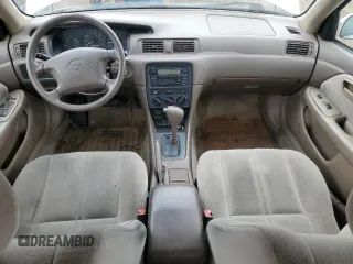 2000 Toyota Camry CE z VIN 4T1BG22K6YU991932, wystawiony jako Copart lot #55588155 z przebiegiem 188 363 mil mil oraz Szkoda całkowita • Salvage title. Historia ofert i sprzedaży dostępna na DreamBid. Obrazek 8.
