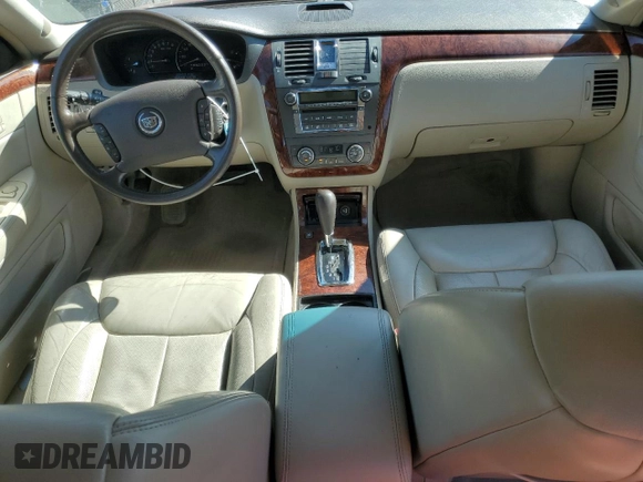 2007 Cadillac DTS V8 z VIN 1G6KD57Y67U181293, wystawiony jako Copart lot #48122555 z przebiegiem 137 962 mil mil oraz Szkody całkowita. Historia ofert i sprzedaży dostępna na DreamBid. Obrazek 8.