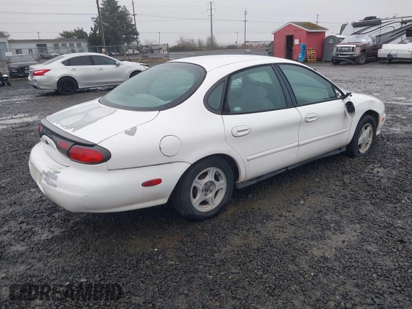 1999 Ford Taurus SE z VIN 1FAFP53U5XA269767, wystawiony jako IAAI lot #41504302 z przebiegiem 182 198 mil mil oraz . Historia ofert i sprzedaży dostępna na DreamBid. Obrazek 4.