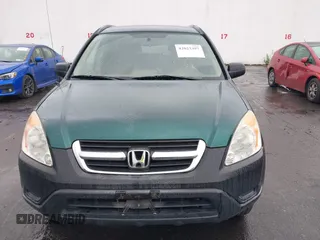 2004 Honda CR-V LX with VIN JHLRD78404C028934, listed as a IAAI auction lot 42023397 with 216,304 mi miles and . Bid and sale history available at carsss.com. Image 6.