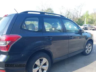 2015 Subaru Forester 2.5i with VIN JF2SJABCXFH599231, listed as a IAAI auction lot 42166220 with 60,409 mi miles and . Bid and sale history available at DreamBid. Image 22.