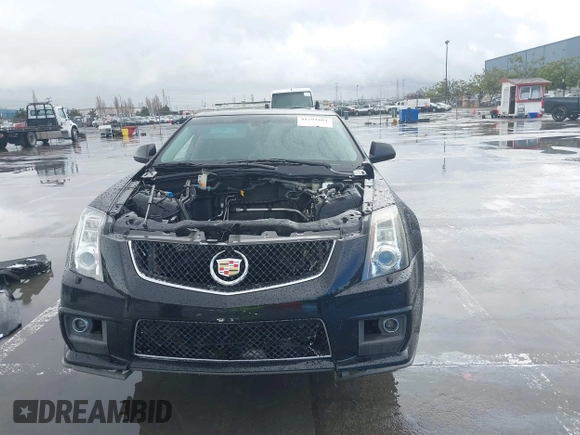 2013 Cadillac CTS-V z VIN 1G6DV5EP0D0102168, wystawiony jako IAAI lot #41791601 z przebiegiem Nie podano mil oraz . Historia ofert i sprzedaży dostępna na DreamBid. Obrazek 6.