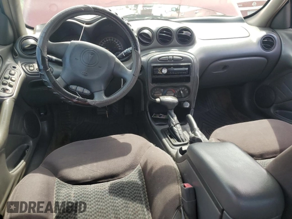 2004 Pontiac Grand Am SE z VIN 1G2NE52F34M596603, wystawiony jako Copart lot #57088665 z przebiegiem 213 295 mil mil oraz Szkoda całkowita • Salvage title. Historia ofert i sprzedaży dostępna na DreamBid. Obrazek 8.