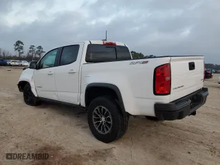 2021 Chevrolet Colorado 4WD ZR2 with VIN 1GCGTEEN8M1285957, listed as a Copart auction lot 44404555 with 55,615 mi miles and Salvage Title. Bid and sale history available at carsss.com. Image 2.