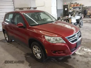 2011 Volkswagen Tiguan SE with VIN WVGBV7AX9BW000461, listed as a IAAI auction lot 42032028 with 149,896 mi miles and . Bid and sale history available at DreamBid. Image 1.