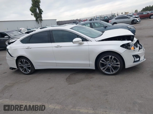 2020 Ford Fusion Titanium with VIN 3FA6P0K92LR103416, listed as a IAAI auction lot 41681810 with 54,902 mi miles and . Bid and sale history available at DreamBid. Image 13.