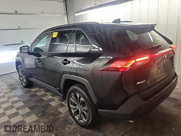 2022 Toyota RAV4 Hybrid XLE Premium with VIN 4T3B6RFV2NU066602, listed as a IAAI auction lot 42339693 with 58,981 mi miles and . Bid and sale history available at DreamBid. Image 1.