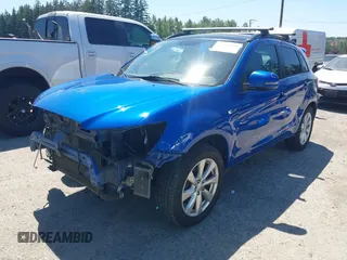2015 Mitsubishi Outlander GT with VIN 4A4AR4AWXFE047335, listed as a IAAI auction lot 42720990 with 164,672 mi miles and . Bid and sale history available at DreamBid. Image 18.