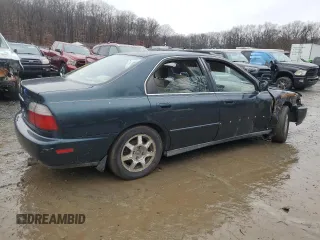 1996 Honda Accord EX with VIN 1HGCD565XTA276994, listed as a Copart auction lot 44344115 with 221,926 mi miles and Salvage Title. Bid and sale history available at DreamBid. Image 3.