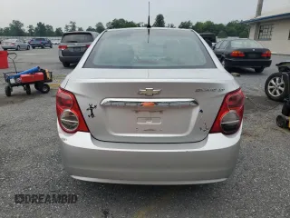 2014 Chevrolet Sonic LT z VIN 1G1JC5SH1E4243983, wystawiony jako Copart lot #59483085 z przebiegiem 106 345 mil mil oraz Szkoda całkowita • Salvage title. Historia ofert i sprzedaży dostępna na DreamBid. Obrazek 6.