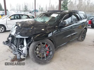 2023 Dodge Durango SRT 392 Premium with VIN 1C4SDJGJ6PC592871, listed as a IAAI auction lot 41740993 with 9,028 mi miles and . Bid and sale history available at DreamBid. Image 17.