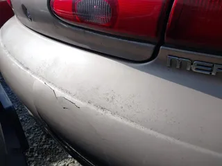1998 Mercury Sable LS z VIN 1MEFM53S9WG642269, wystawiony jako IAAI lot #41737380 z przebiegiem 222 896 mil mil oraz . Historia ofert i sprzedaży dostępna na DreamBid. Obrazek 12.