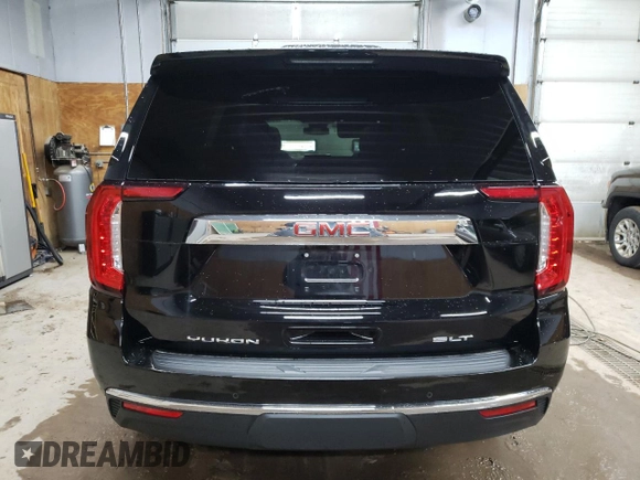 2024 GMC Yukon SLT with VIN 1GKS2BKDXRR331079, listed as a Copart auction lot 79533764 with 8,233 mi miles and Clean Title. Bid and sale history available at carsss.com. Image 6.