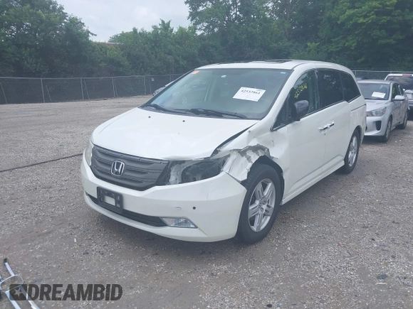 2013 Honda Odyssey Touring with VIN 5FNRL5H9XDB049390, listed as a IAAI auction lot 42532861 with 129,376 mi miles and . Bid and sale history available at DreamBid. Image 19.