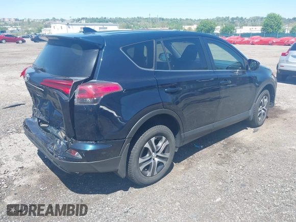 2017 Toyota RAV4 LE with VIN JTMBFREV8HJ168975, listed as a IAAI auction lot 42139354 with 91,394 mi miles and . Bid and sale history available at DreamBid. Image 4.