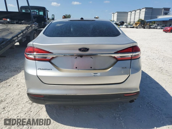 2017 Ford Fusion SE z VIN 3FA6P0H77HR146663, wystawiony jako Copart lot #56322425 z przebiegiem 77 361 mil mil oraz Czysty tytuł • Clean title. Historia ofert i sprzedaży dostępna na DreamBid. Obrazek 6.