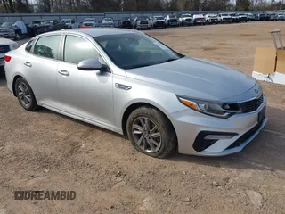 2020 Kia Optima LX with VIN 5XXGT4L34LG439434, listed as a IAAI auction lot 41743129 with 77,409 mi miles and . Bid and sale history available at carsss.com. Image 1.