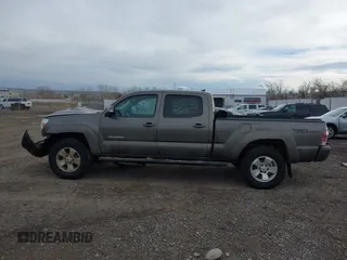 2014 Toyota Tacoma with VIN 3TMMU4FN7EM067182, listed as a IAAI auction lot 41108551 with 156,398 mi miles and . Bid and sale history available at DreamBid. Image 14.