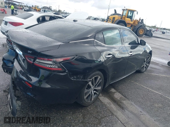 2020 Nissan Maxima SV z VIN 1N4AA6CV3LC369536, wystawiony jako IAAI lot #41793232 z przebiegiem 91 483 mil mil oraz . Historia ofert i sprzedaży dostępna na DreamBid. Obrazek 4.