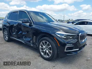 2019 BMW X5 xDrive40i with VIN 5UXCR6C59KLL23735, listed as a IAAI auction lot 41999791 with 31,072 mi miles. Bid and sale history available at carsss.com. Image 1.