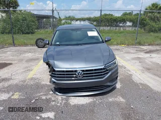 2021 Volkswagen Jetta S z VIN 3VWC57BU4MM009727, wystawiony jako IAAI lot #42339309 z przebiegiem 52 395 mil mil oraz . Historia ofert i sprzedaży dostępna na DreamBid. Obrazek 13.
