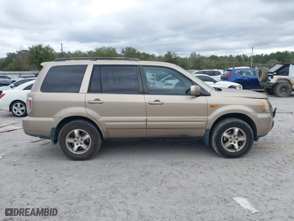 2006 Honda Pilot EX-L with VIN 5FNYF28566B010295, listed as a IAAI auction lot 41654433 with 302,539 mi miles. Bid and sale history available at carsss.com. Image 13.